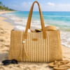 Enrico Benetti strandtas naturel raffia met leren hengsels en kwastje op het strand